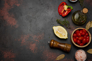 Cherry tomatoes, red bell pepper halves, lemon, thyme sprigs, an, a Food & Drink Photo by ndanko