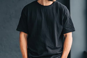 Young man in casual black outfit, a Person Photo by AlyaAnd