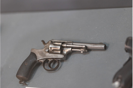 A metallic revolver pistol, an Industrial Photo by Barcelona_dreams