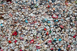 chewing gums forming a colorful urban mosaic, a Photo by Nito