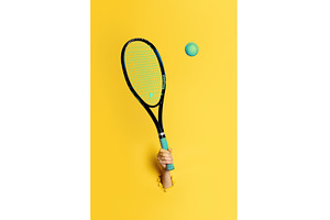 Hand holding tennis racket hitting a, a Sports & Recreation Photo by Gladkov photography