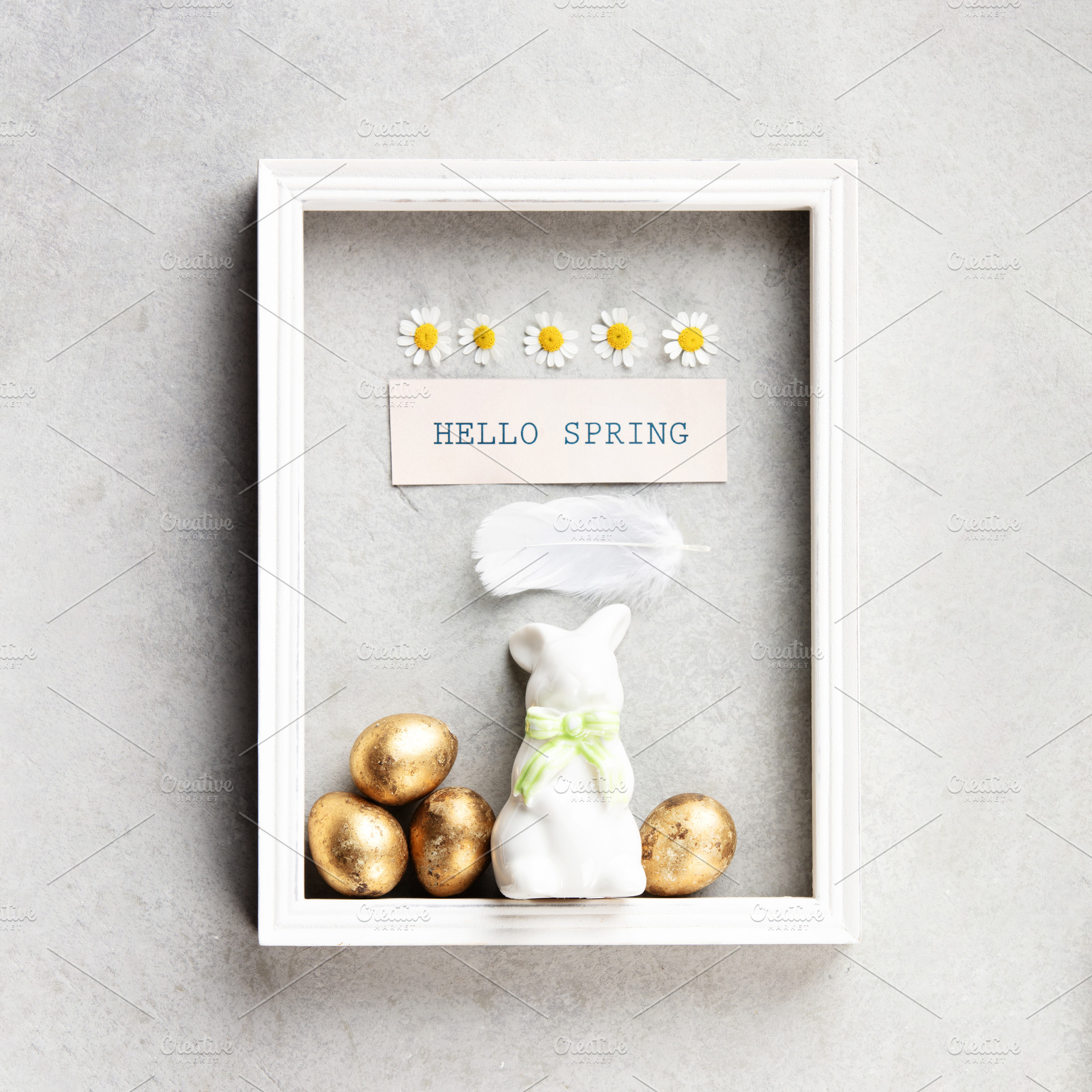 Hello Spring Easter Frame Mockup with Bunny and Golden Eggs, a Holiday Photo by Natalia Klenova's Shop