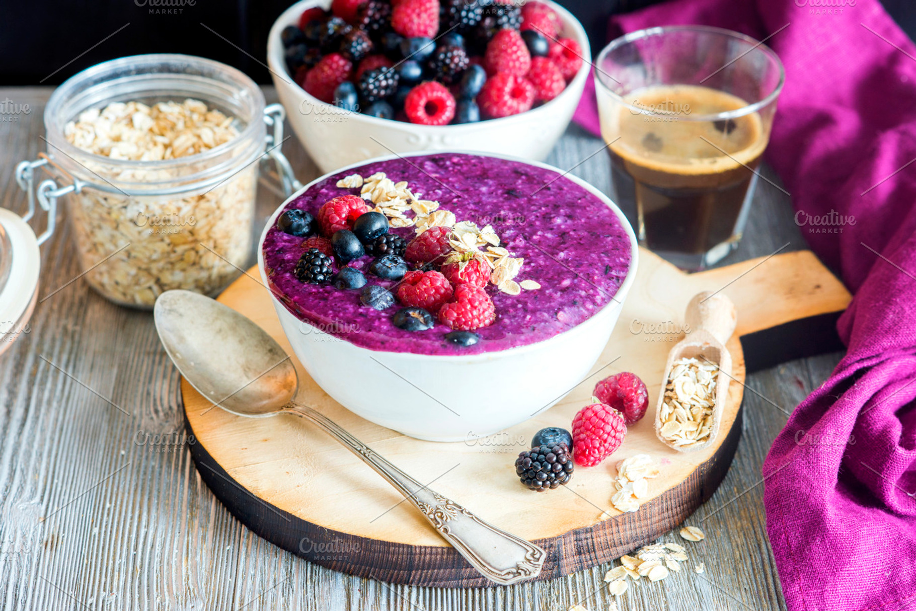Healthy beautiful oatmeal berry smoothie bowl for breakfast, a Food & Drink Photo by saharisha