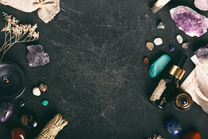 Healing Crystals and Essential Oil on Dark Textured Background, a Nature Photo by Natalia Klenova's Shop