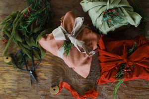 Merry Christmas! Stylish christmas presents wrapped in fabric wi, a Holiday Photo by Sonjachni