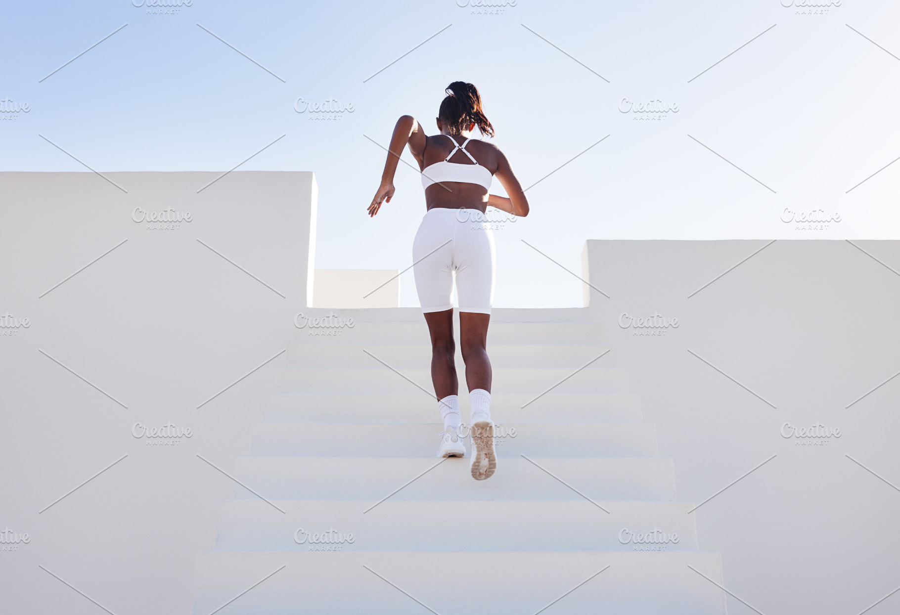 Back view of a woman in white sports, a Sports & Recreation Photo by Artem Varnitsin
