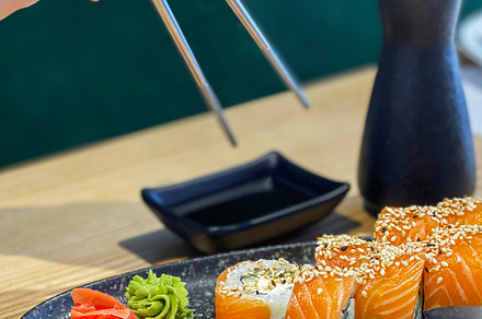 Eating roll sushi, a Food & Drink Photo by Olena Rudo