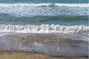 Frozen motion of waves crashing onto, a Nature Photo by Backyard Stock