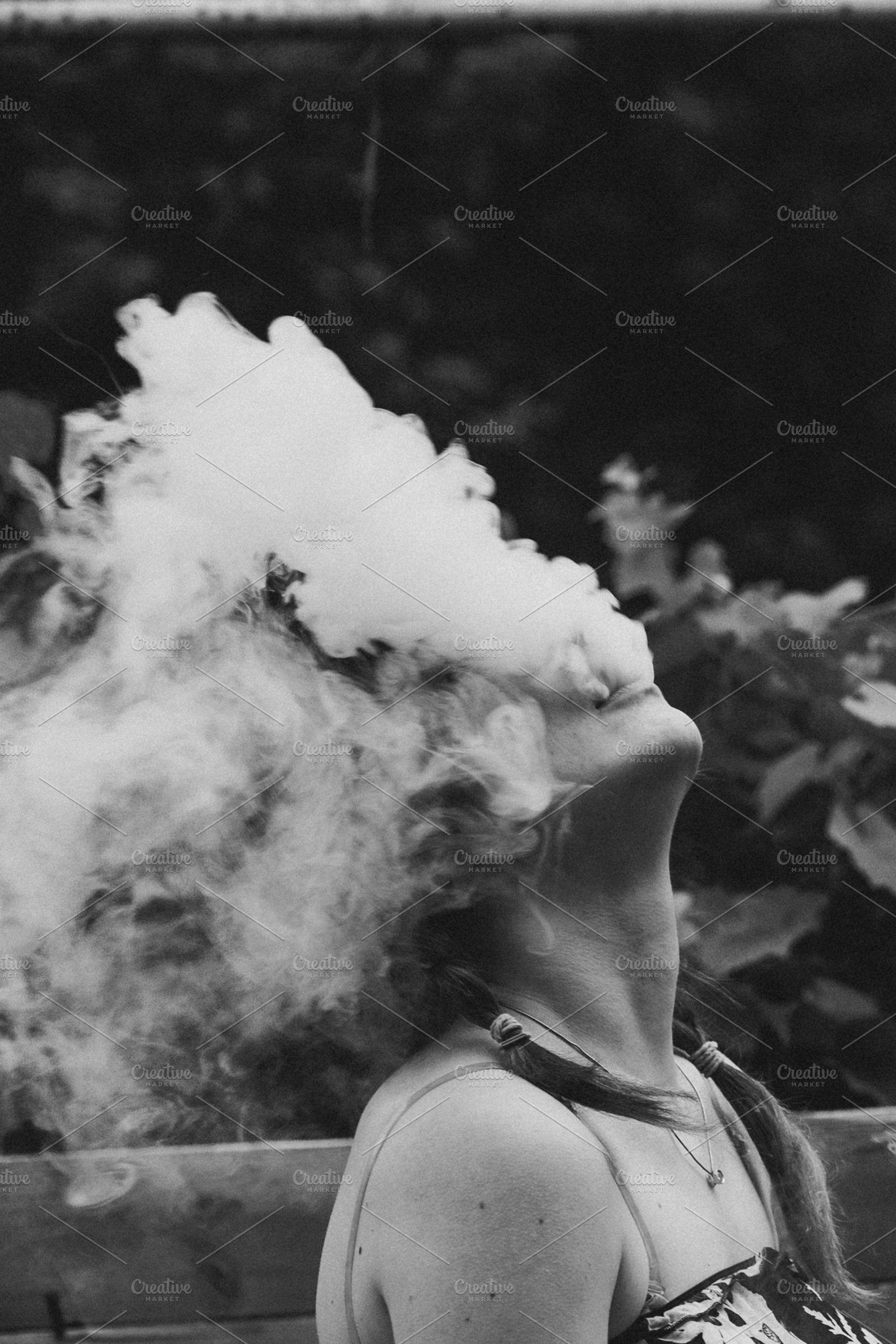 Girl and vapour on a dark background containing vaping, girl, and e-cigarette, a Person Photo by ruslan117