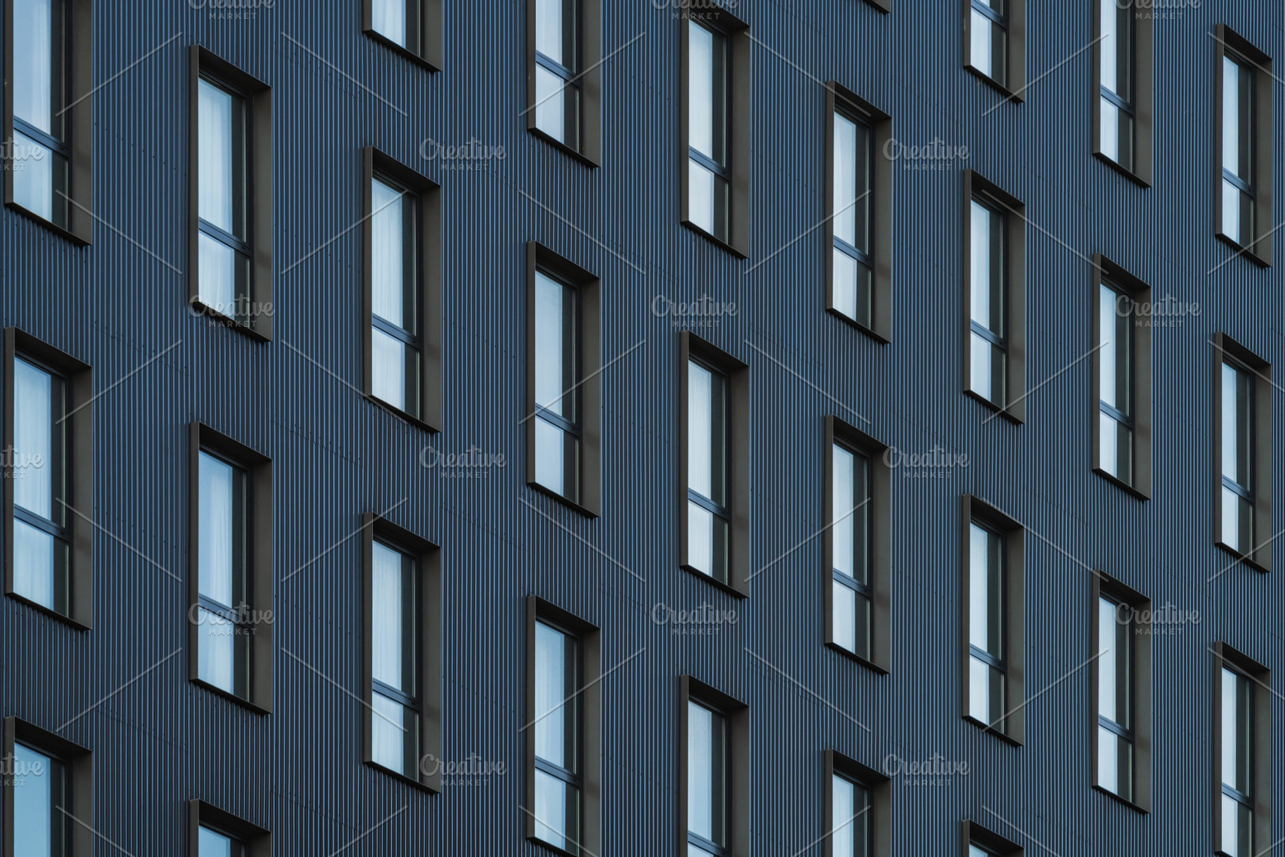 Windows of a residential building, an Architecture Photo by Visual Motiv