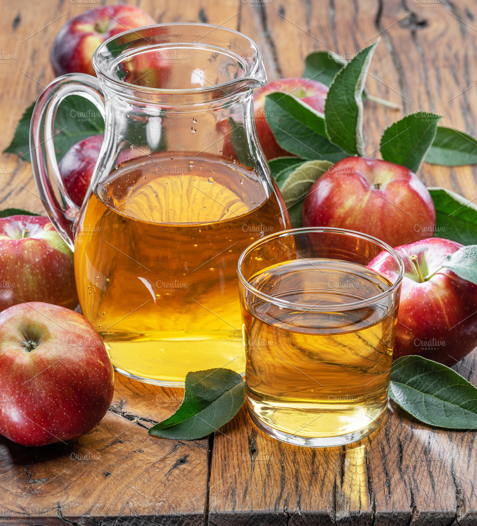Glass and carafe of fresh apple juic, a Food & Drink Photo by Volff