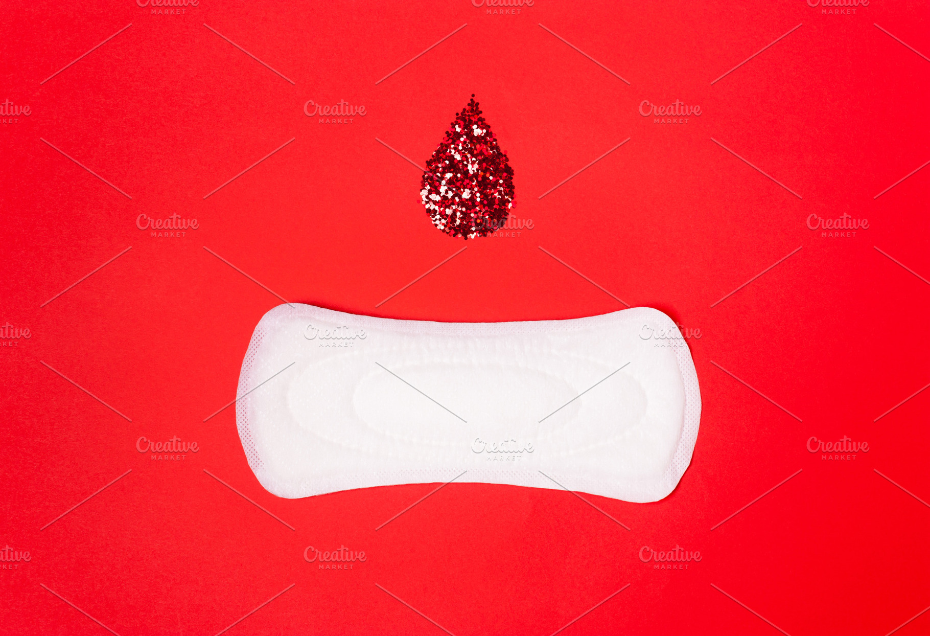 On the coral red background is a fem, an Abstract Photo by KulT design