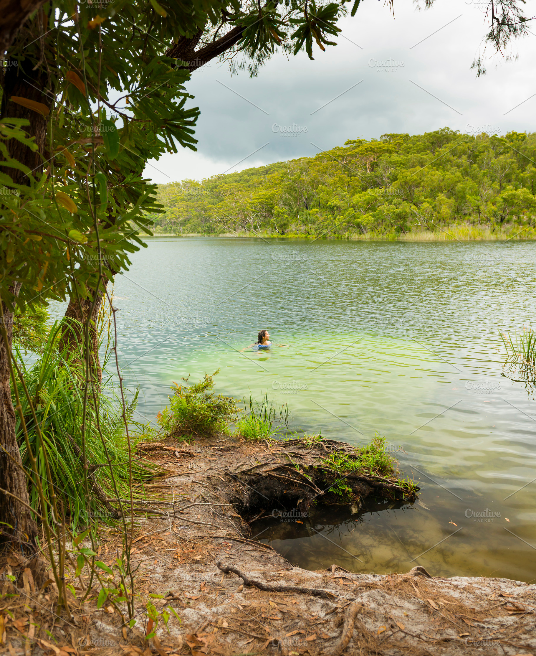 Swimming in Blue Lake Stradbroke Island, a Person Photo by THP Creative