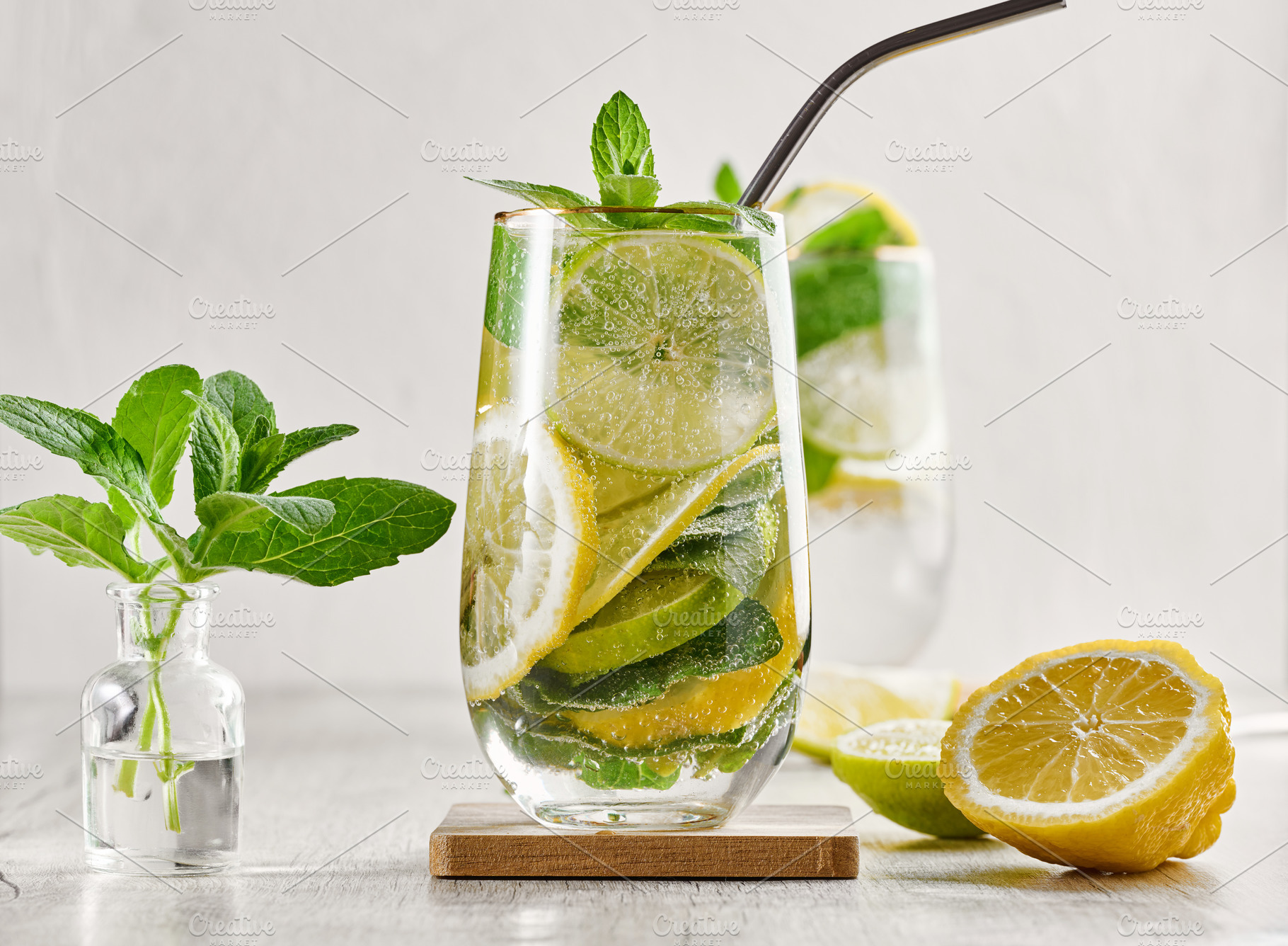 Summer drink with lime and mint. Cold drink, non-alcoholic mojit, a Food & Drink Photo by ndanko