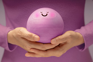 Hands gently holding Smiling Circle face. Mental health, emotion, a Photo by salmon.black