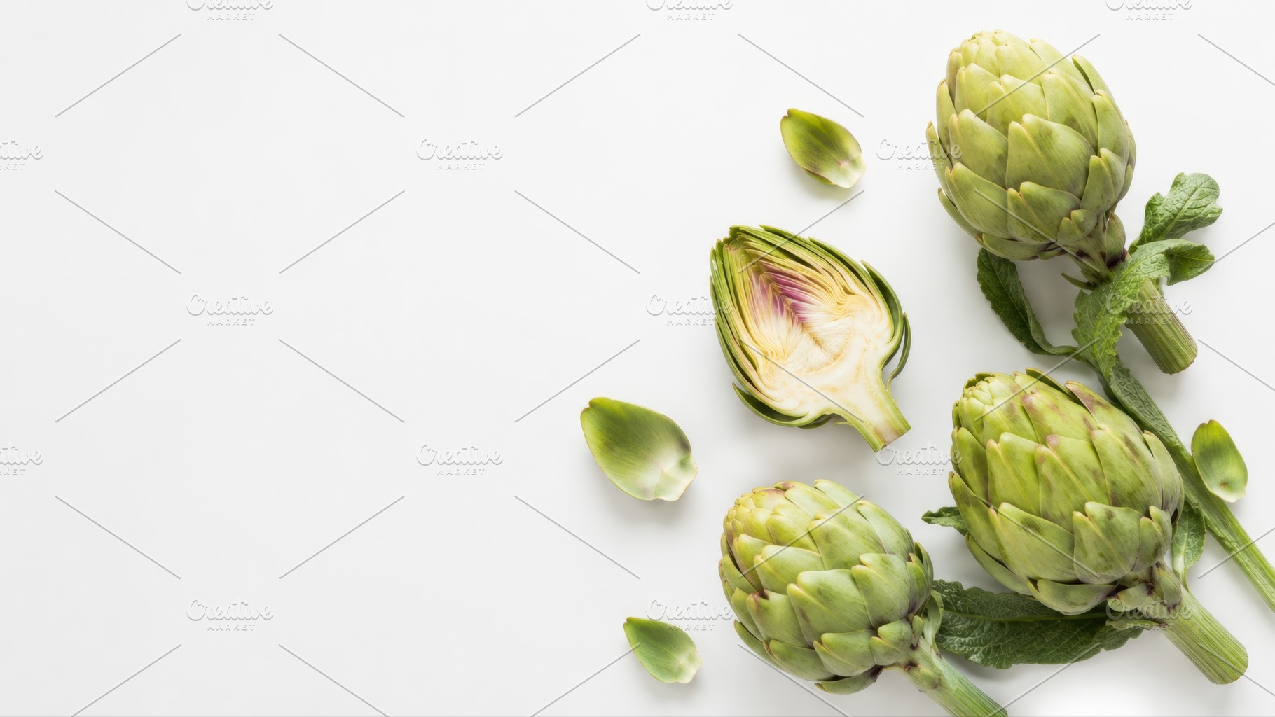 Artichokes on a white background, a Photo by Beautiful things