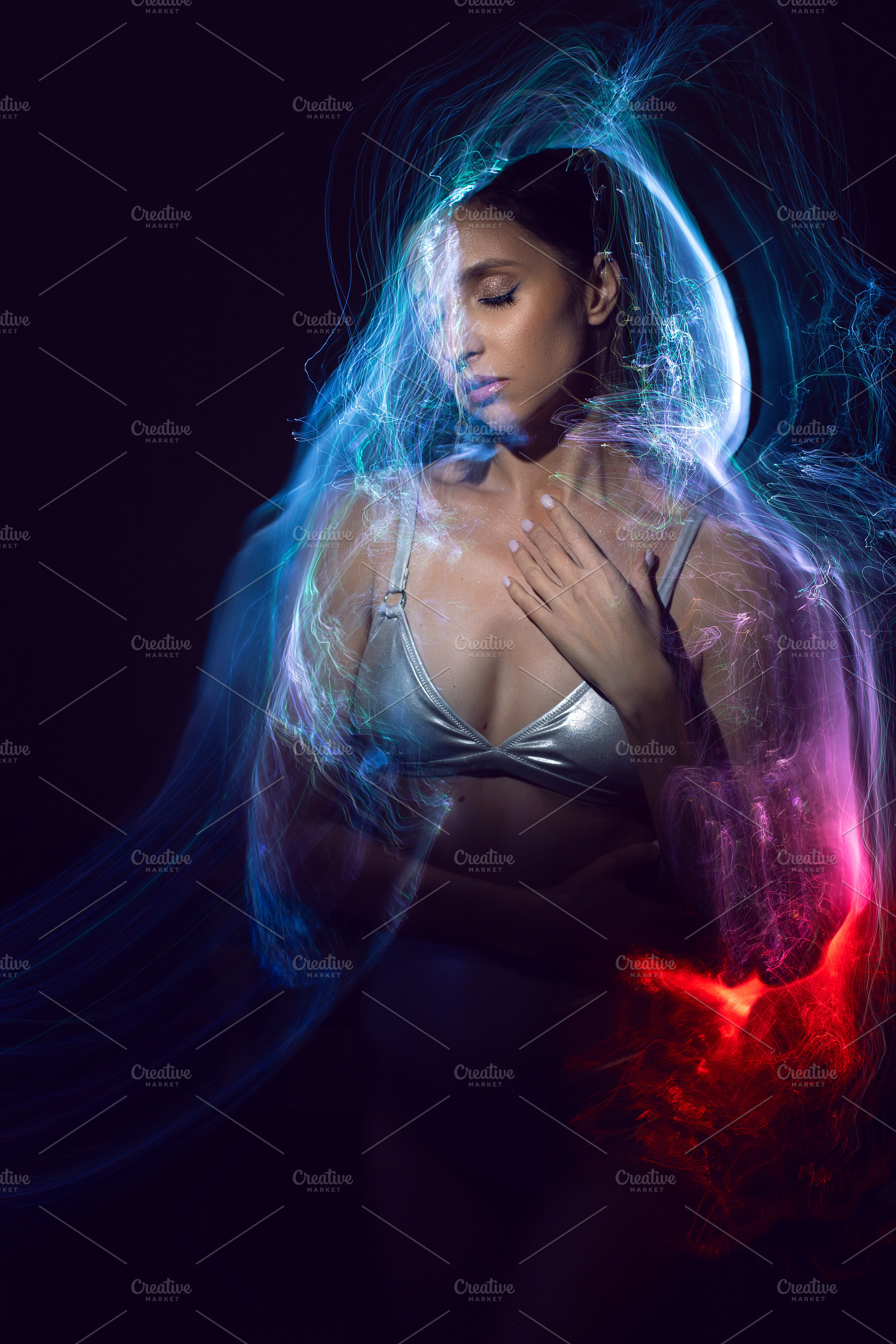 portrait cyber futuristic elegant lady in a silver swimsuit vogue look isolated, a Person Photo by SaulichPhoto