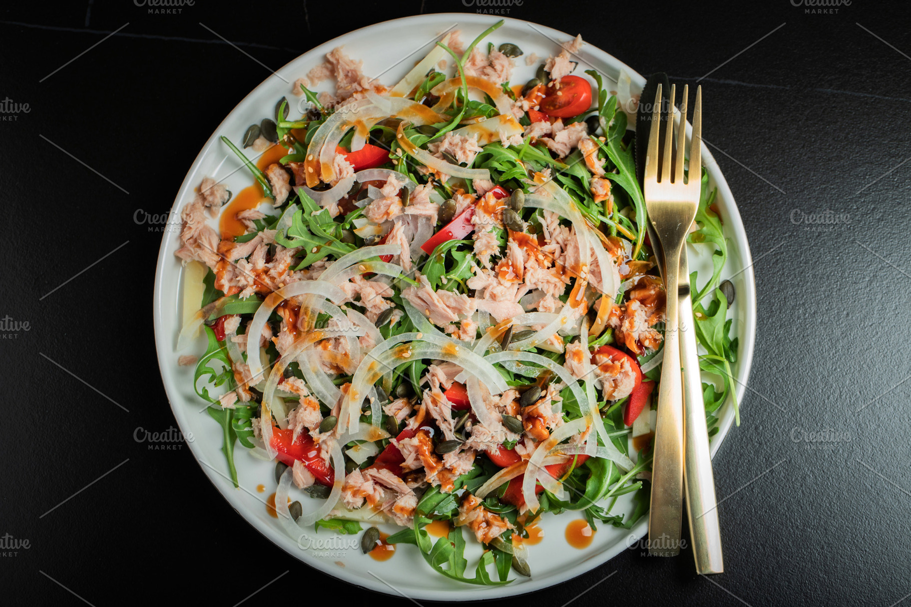 Fresh Tuna Salad with Onions and Cherry Tomatoes. Italian Mediterranean Cuisine, a Food & Drink Photo by Budarinphoto