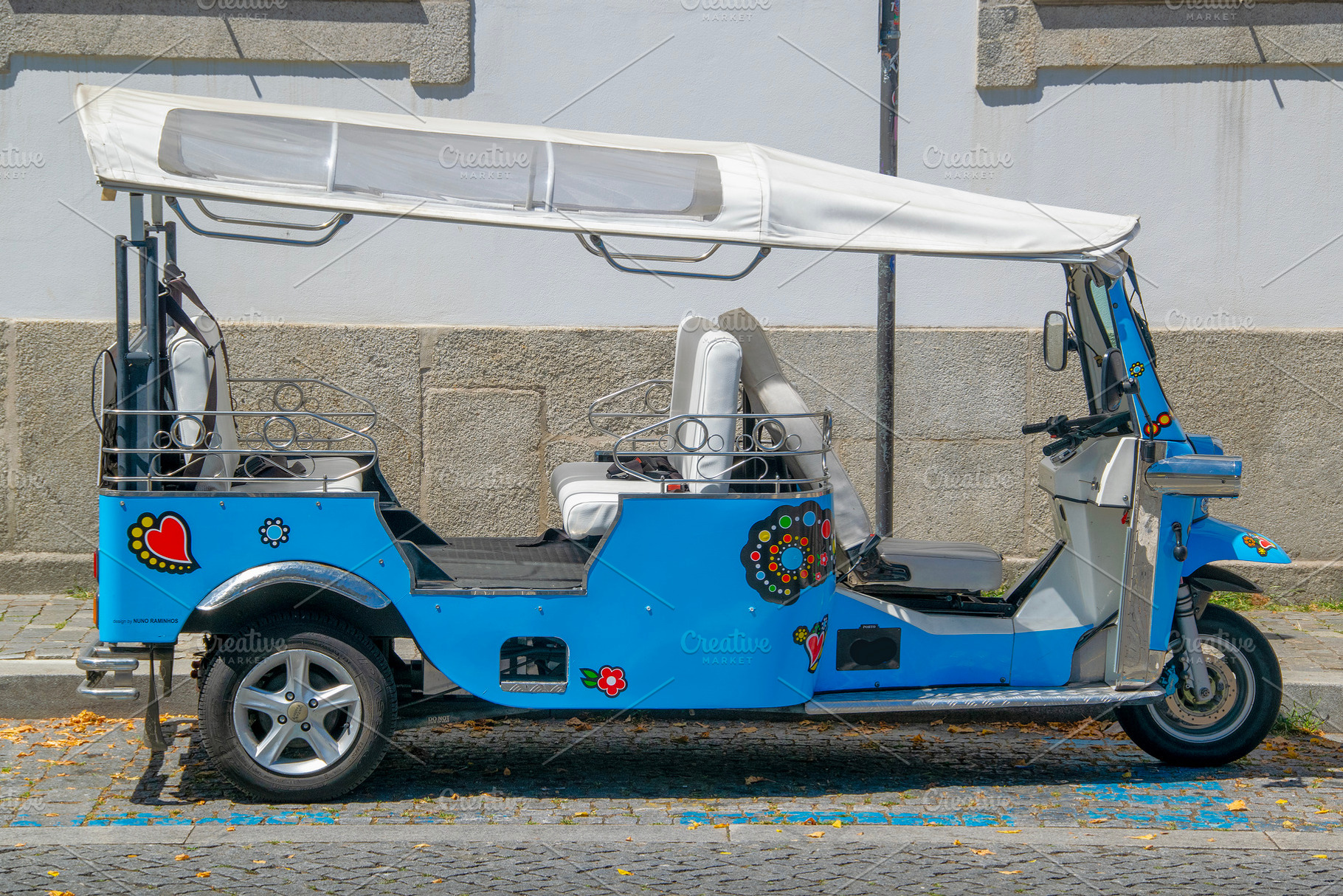 Electric vehicle parked at street, a Transportation Photo by DanFLCreativo