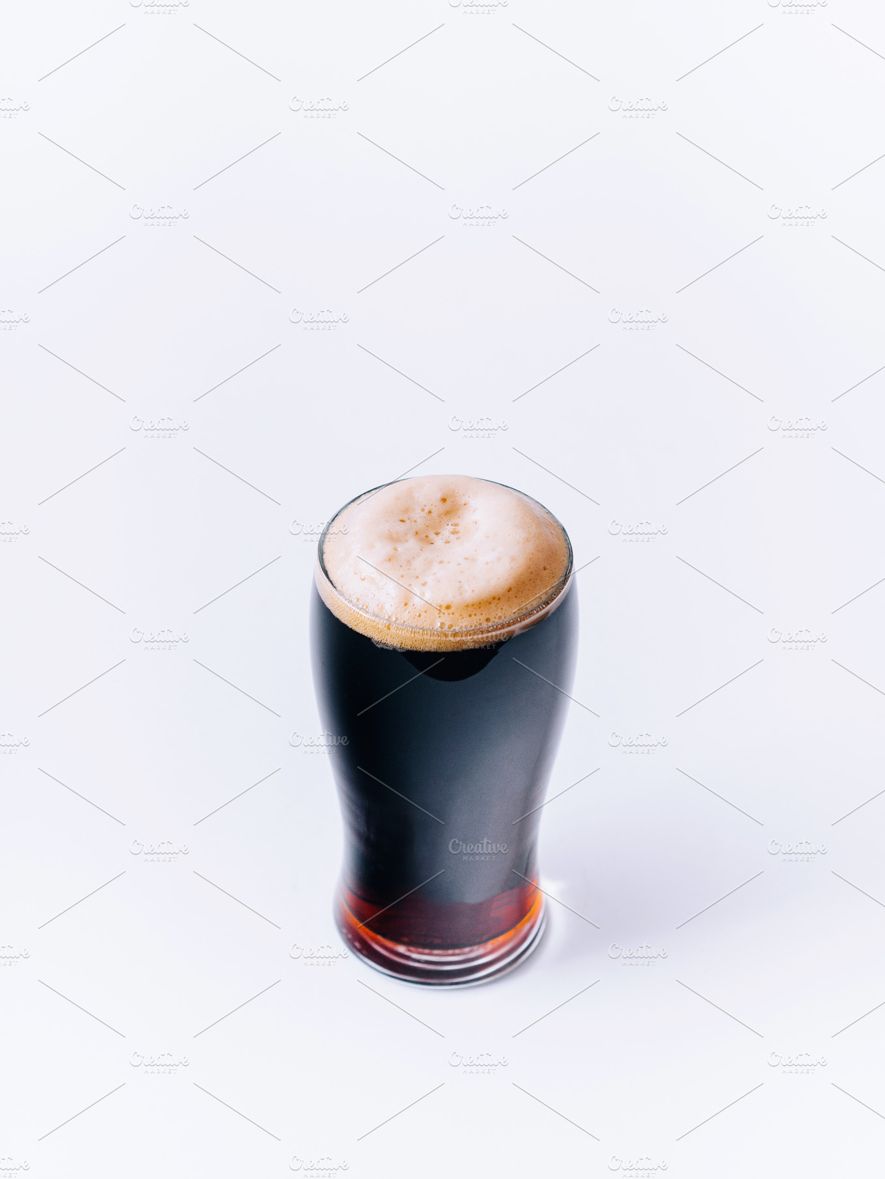 Glass of stout beer containing stout, beer, and guiness, a Food & Drink Photo by Pawel Kadysz