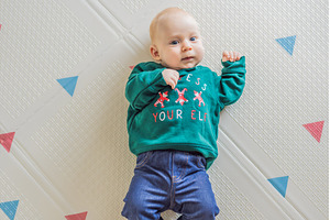 Adorable baby dressed in a Christmas, a Person Photo by Elizaveta Galitskaya