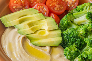 Healthy Hummus Bowl With Avocado Broccoli And Cherry Tomatoes, a Food & Drink Photo by Alexander Prokopenko