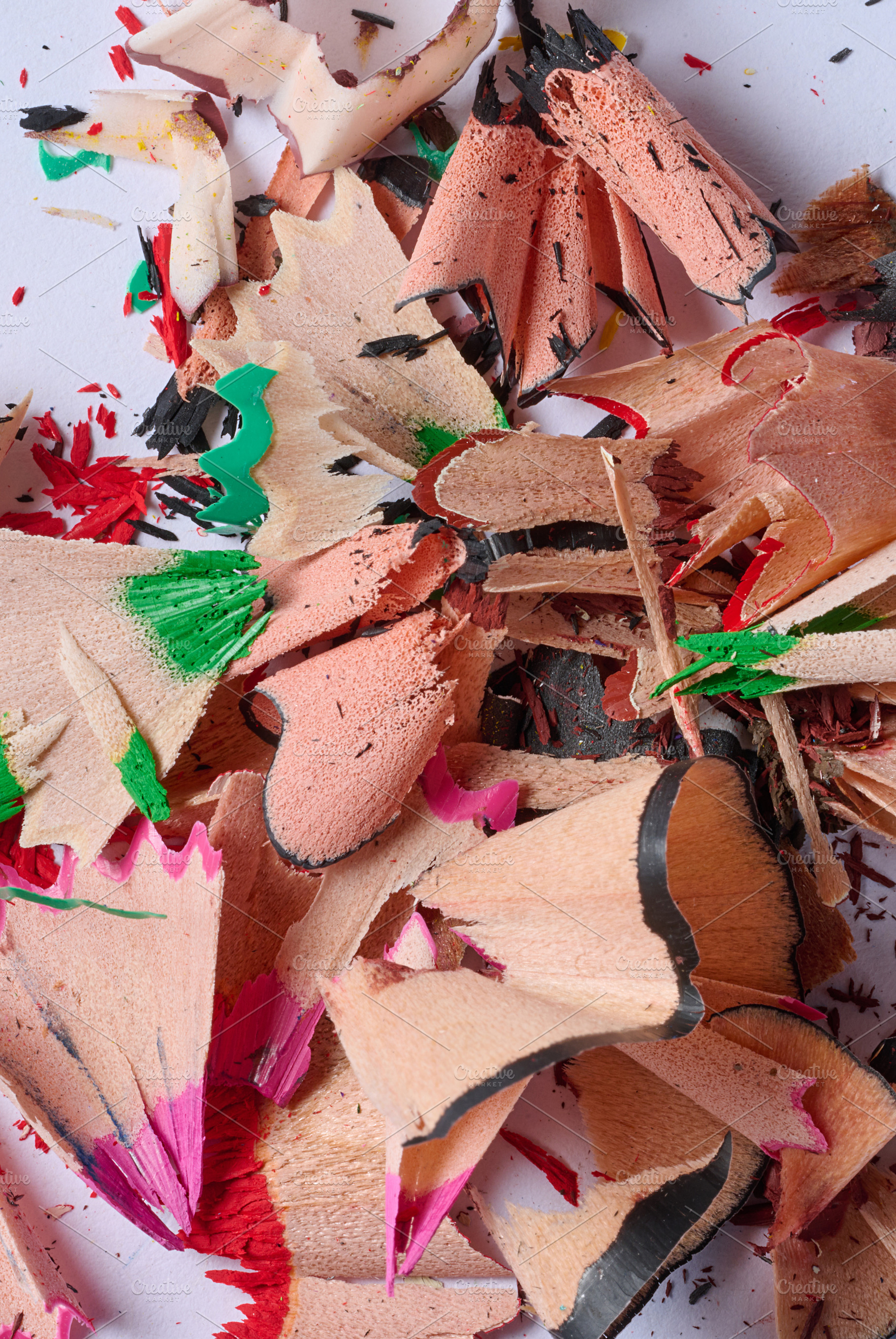 Close-up of a pile of spiral shavings from sharpening colored pe, a School & Education Photo by ndanko