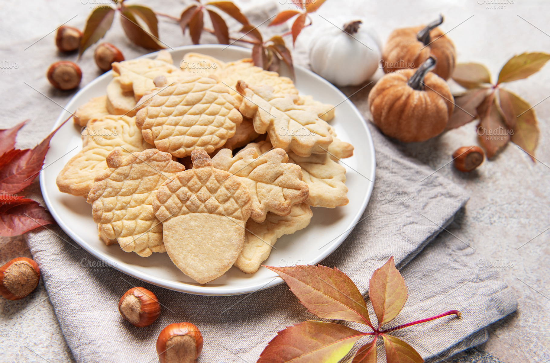 Autumn cookies shaped as leaves and acorns, a Food & Drink Photo by Olena Rudo
