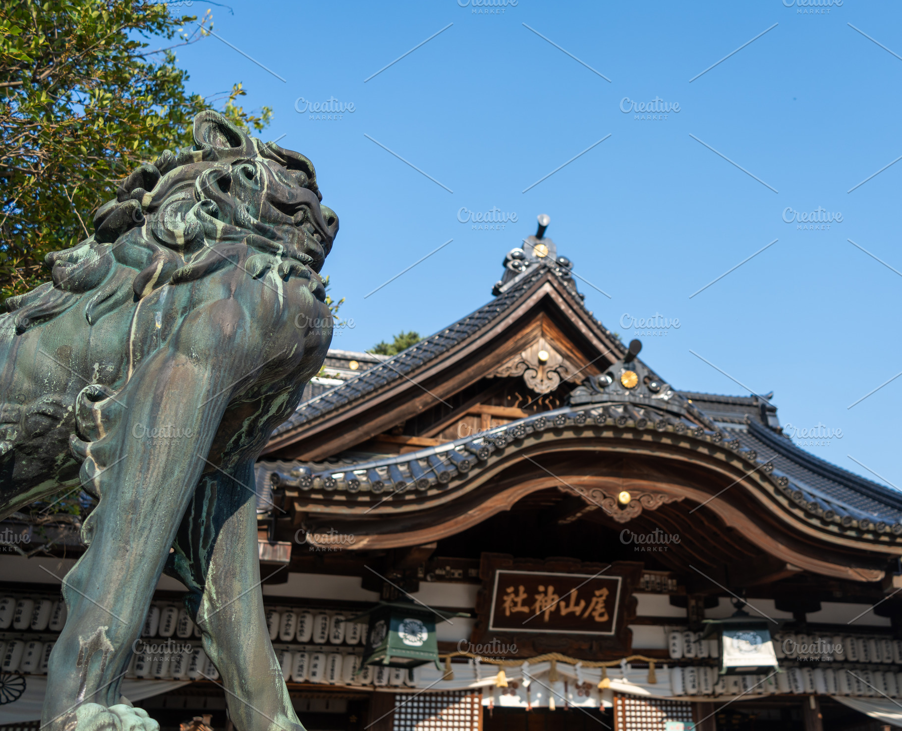 Statue and roof of Oyama-Jinja Shrine in Kanazawa, Japan, an Architecture Photo by GoodGoods