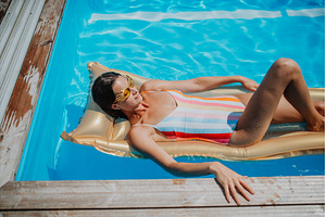Top view of young woman in swimming