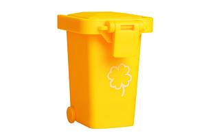 Bright yellow plastic recycling bin with shamrock motif, isolate, an Industrial Photo by Ales Munt