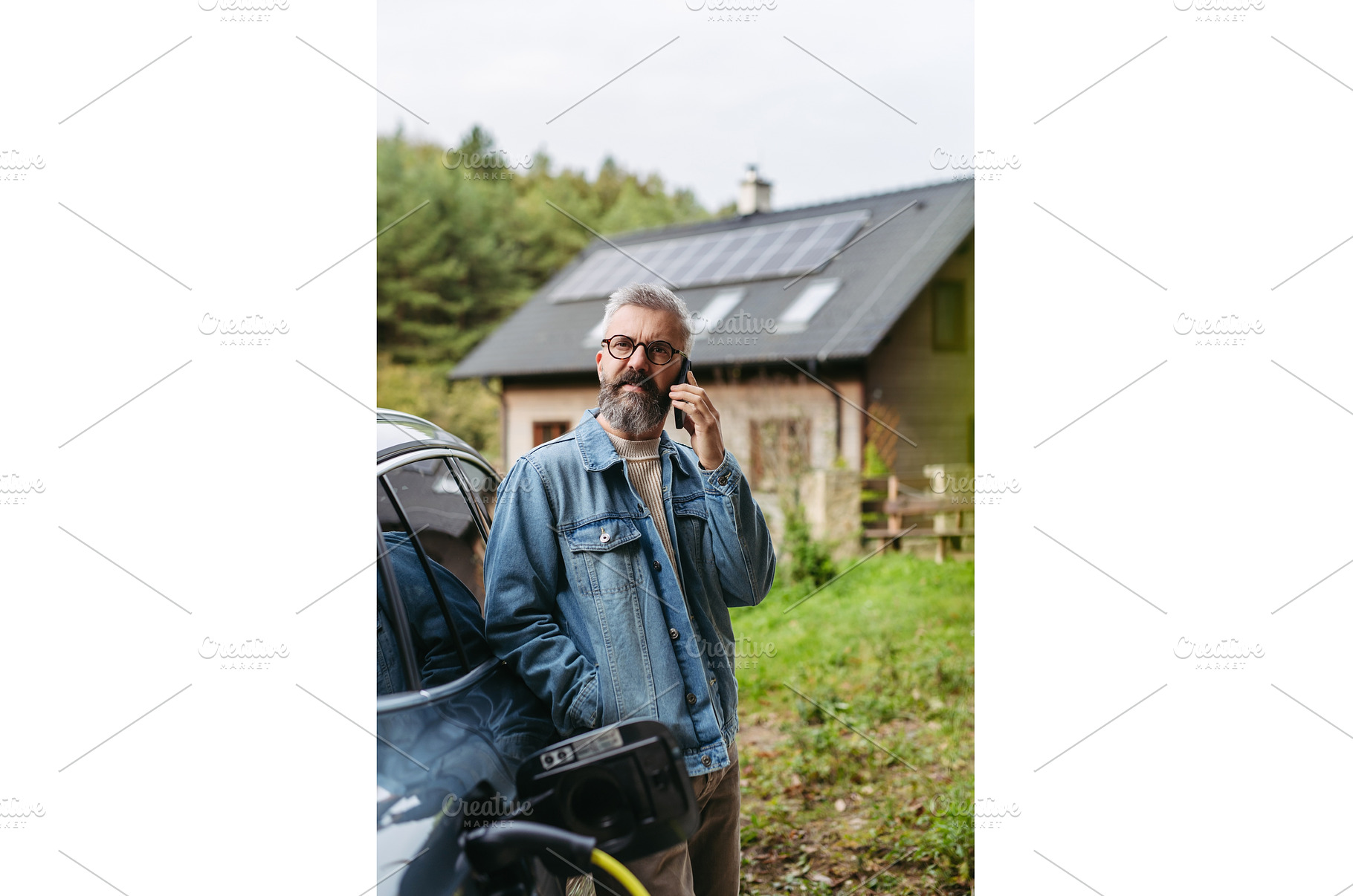 Man charging electric car in front, a Transportation Photo by HalfPoint