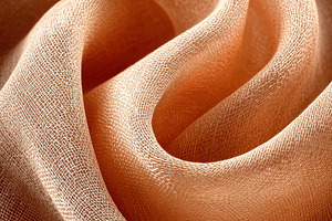 Elegant Peach-Colored Fabric Draped, an Abstract Photo by Pixeness Studio