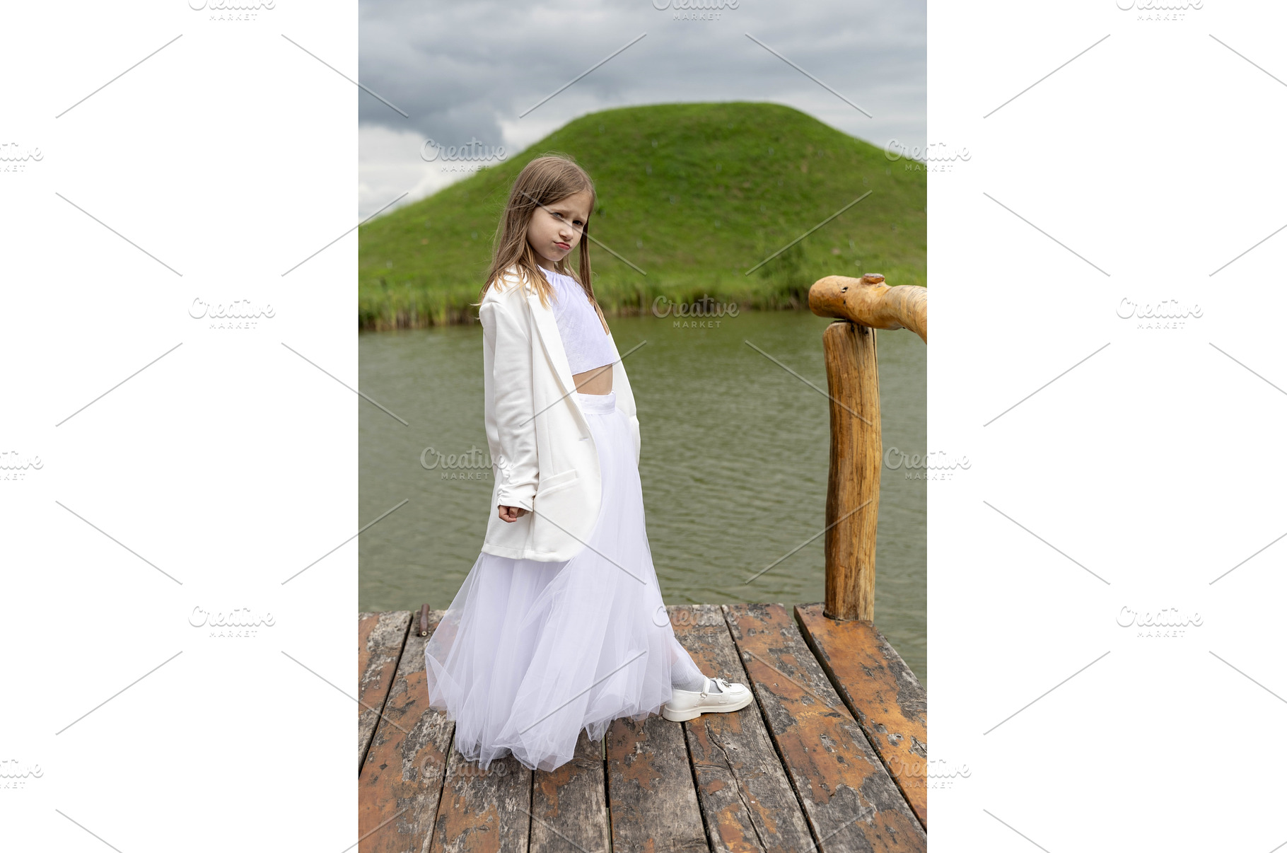 Little girl in a white festive dress, a Person Photo by Nenahliadava Design