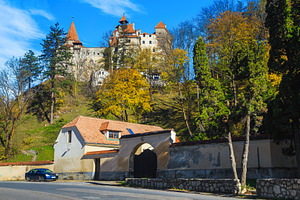 Autumn scenery and Bran castle, an Architecture Photo by Alpine Dreams