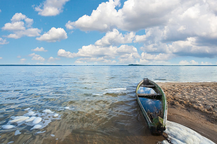 Old flooding boat on summer lake shore, a Nature Photo by YuriyB