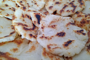Close-up detail shot of many arepas, a Food & Drink Photo by DanFLCreativo
