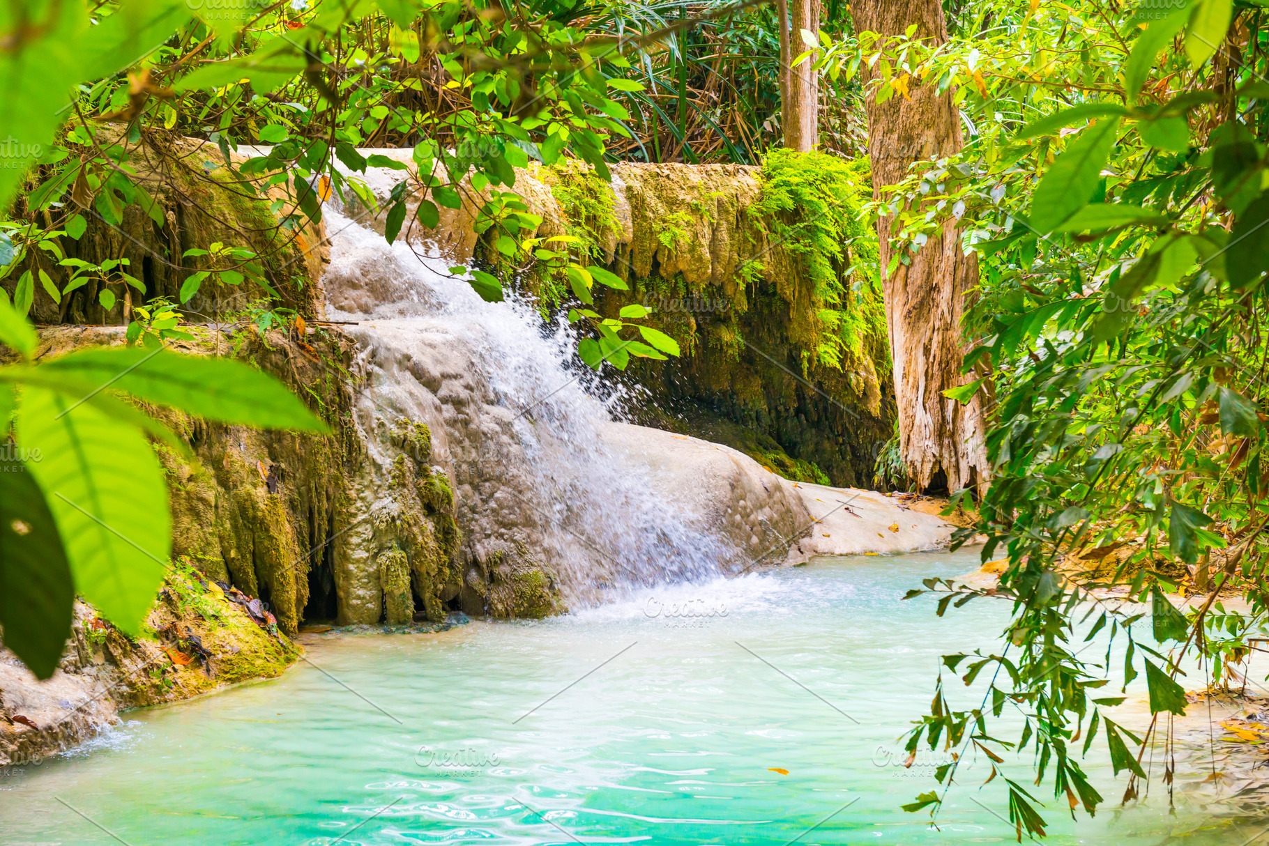 Beautiful waterfall in wild rainforest in Erawan National park,, a Nature Photo by Vapi