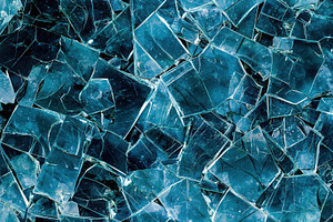 Shattered glass pieces, showcasing sharp edges and varying shades of blue and c, a Background Photo by Textures & Backgrounds