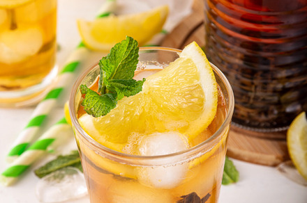 Iced tea cocktail drink, cold summer drink with black tea, a Food & Drink Photo by Rimma