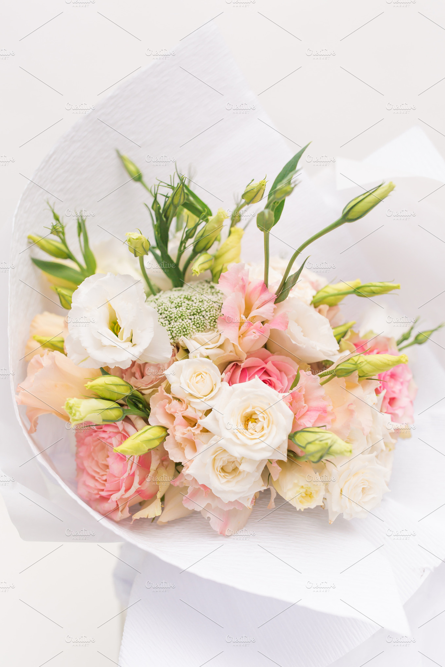 Styled flowers stock photo featuring flowers, gift, and stylish, a Nature Photo by The Snap Shop
