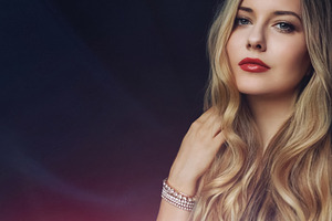 Elegant woman with blonde wavy hair and vibrant red lipstick wea, a Person Photo by Studio ANNA