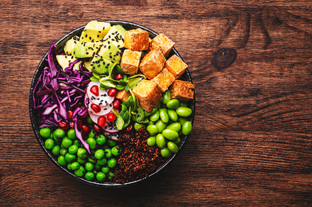 Vegan vegetarian buddha bowl with quinoa, fried tofu, avocado, e, a Food & Drink Photo by 5PH
