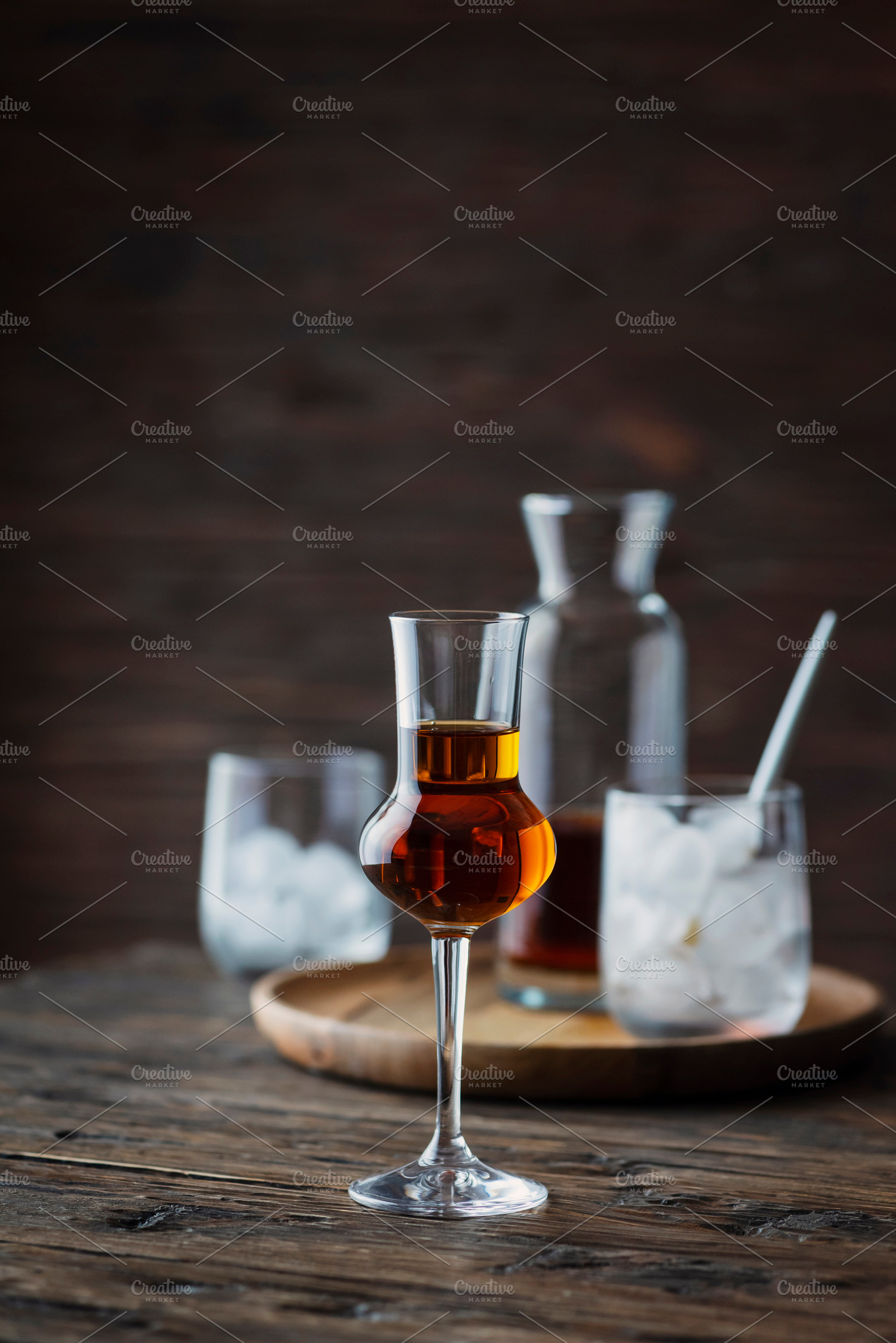 A shot of a strong ligueur with ice stock photo containing selective focus, a Food & Drink Photo by oxana.denezhkina