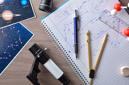 Astronomy study with notebook and supplies photographs and teles, a School & Education Photo by Davizro's Market