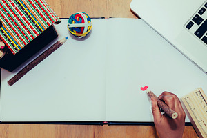 A boy drawing in a workspace