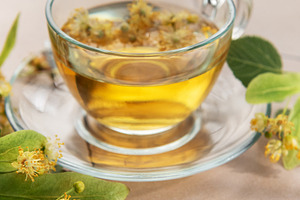 Linden tea cup with fresh lime blossoms, a Food & Drink Photo by Olena Rudo