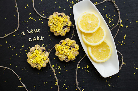 lemon cupcakes on a black background, a Food & Drink Photo by Artsaba Family