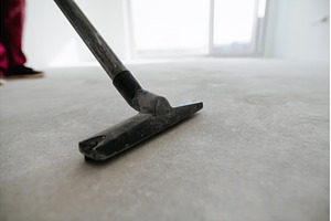 Vacuum cleaning concrete floor, an Architecture Photo by HalfPoint