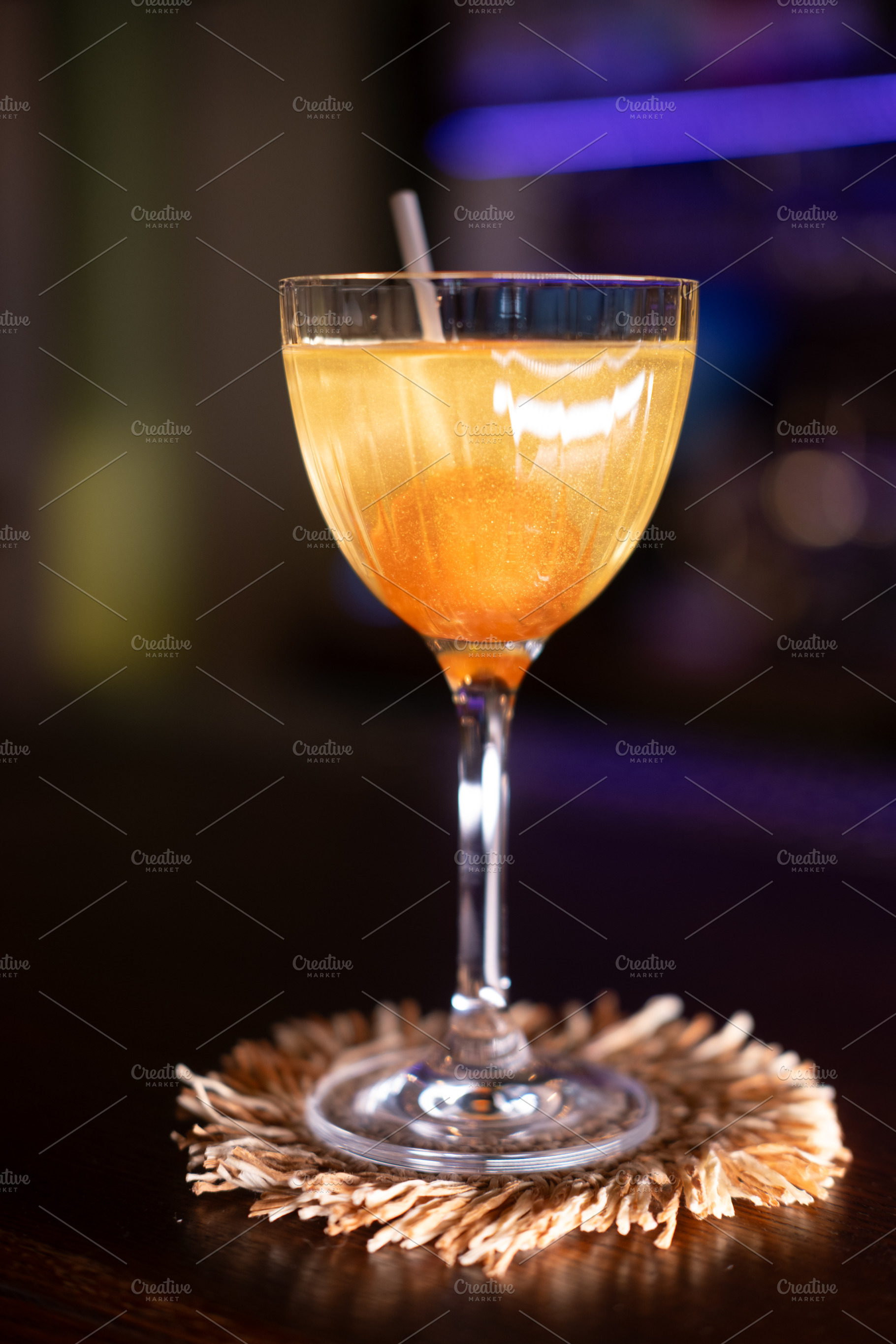 Cocktail served pub order glass yellow exotic mat, a Food & Drink Photo by Photo Drive Studio